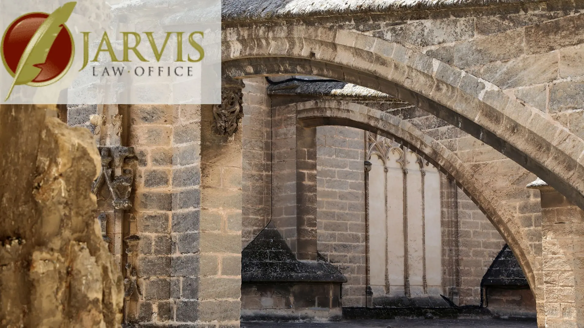 Stone Gothic arches with Jarvis Law Office logo