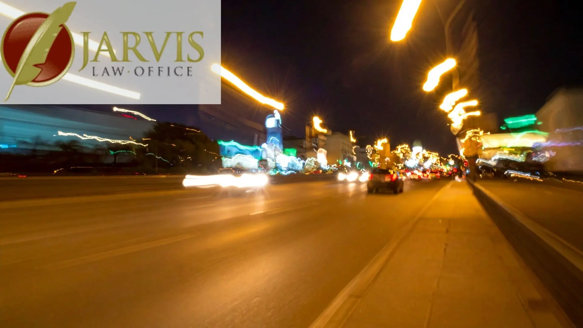 Blurred city street at night with light trails