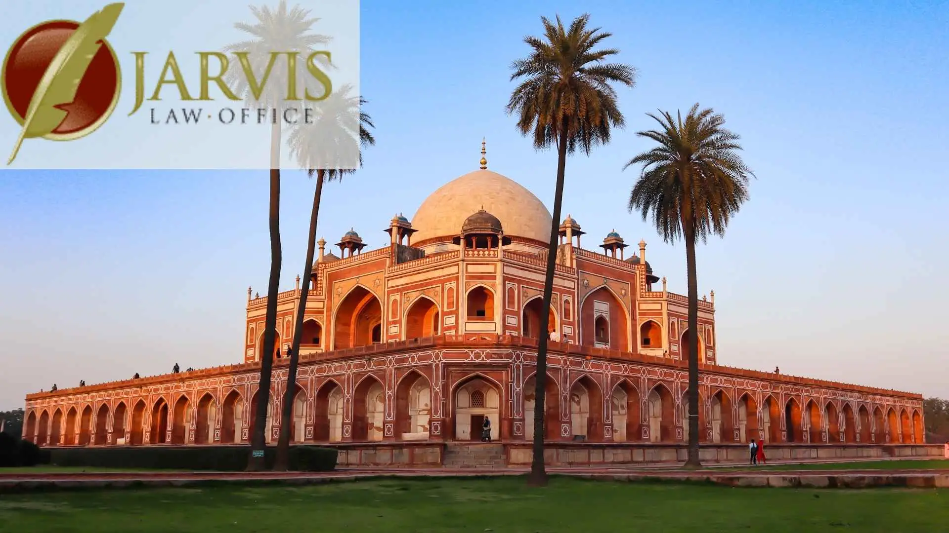 Humayun's Tomb with palm trees at sunset