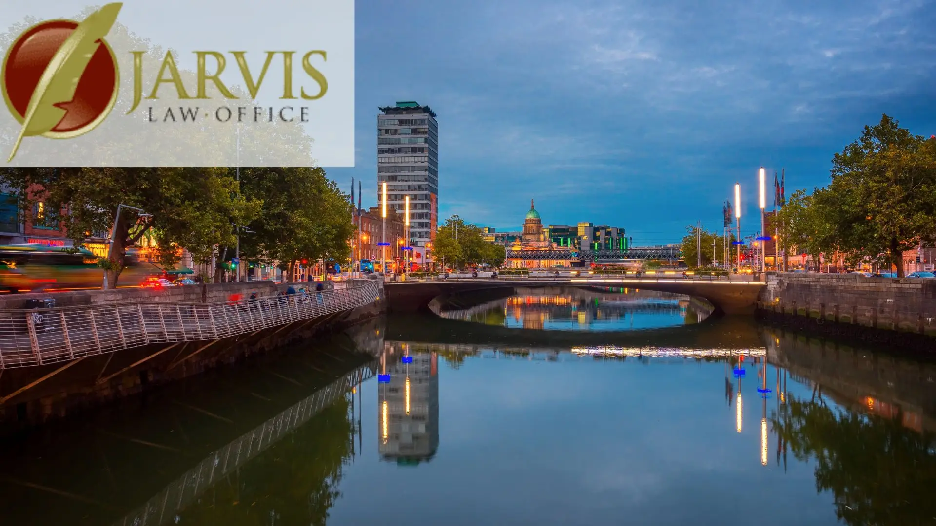 Dublin riverfront at dusk with bridge reflections