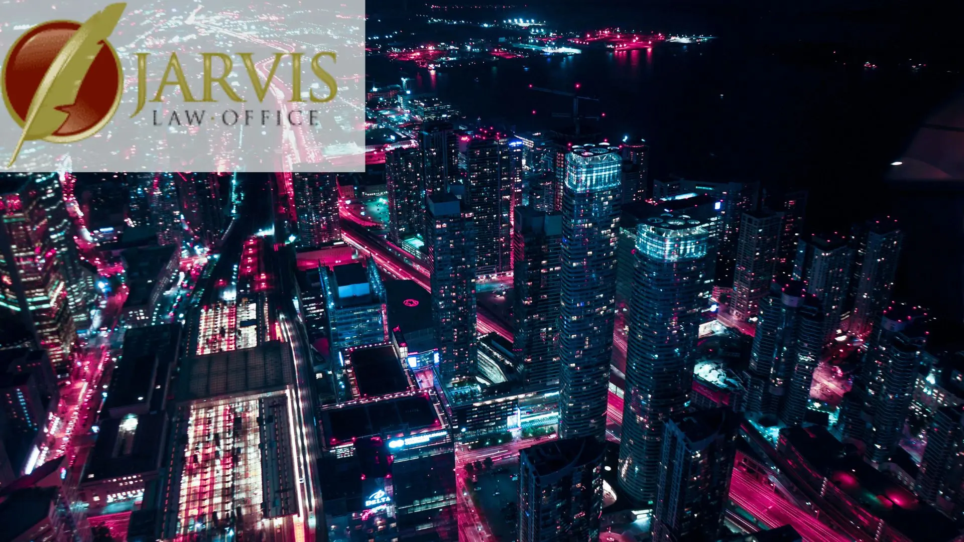 Aerial night city skyline with Jarvis Law Office logo