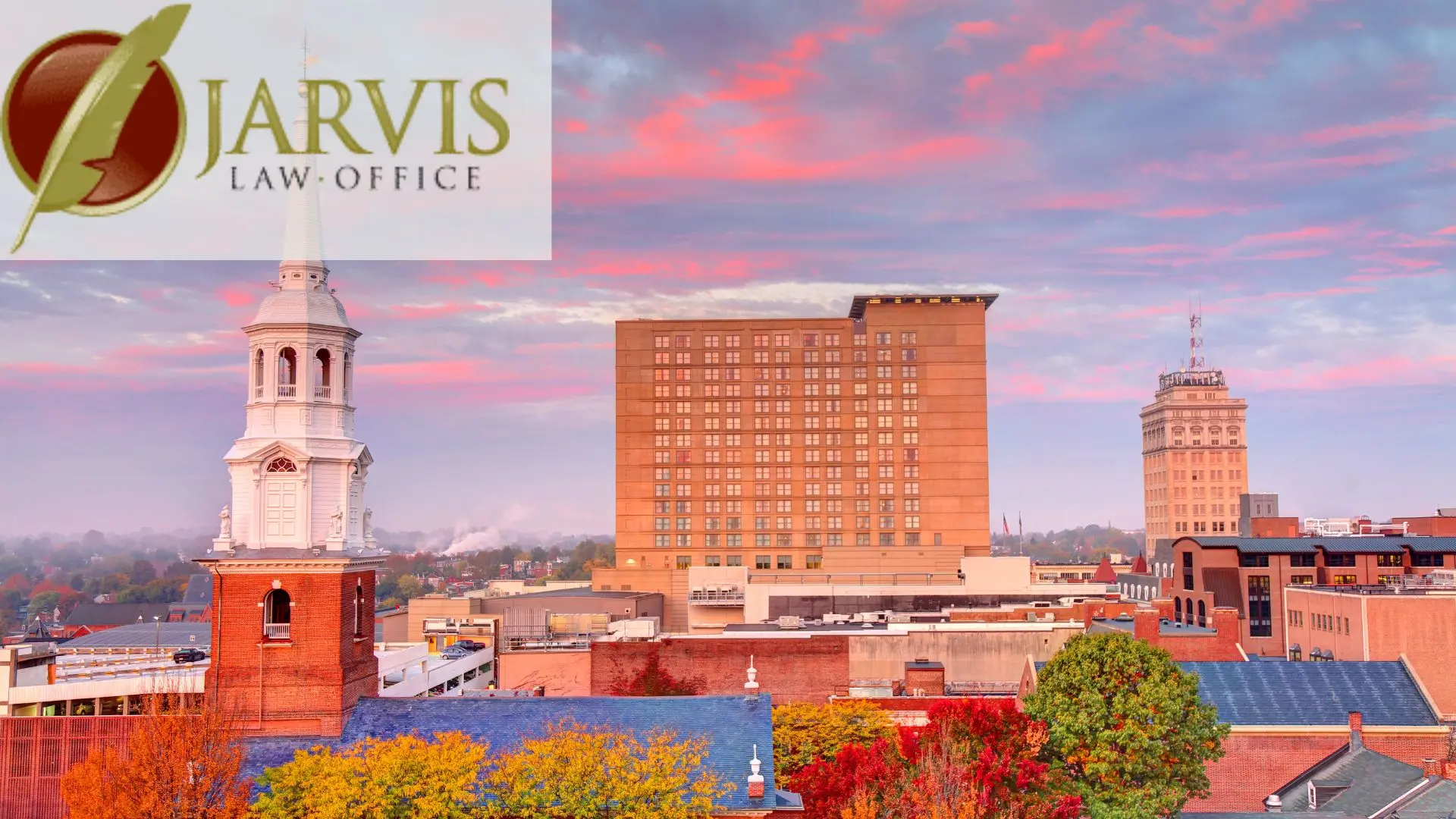City skyline at sunset with church steeple