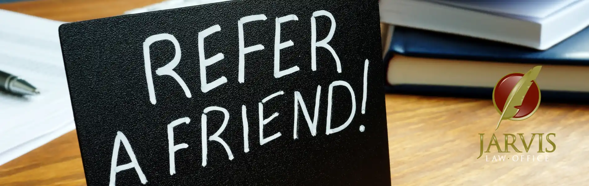 Sign saying 'Refer a Friend'