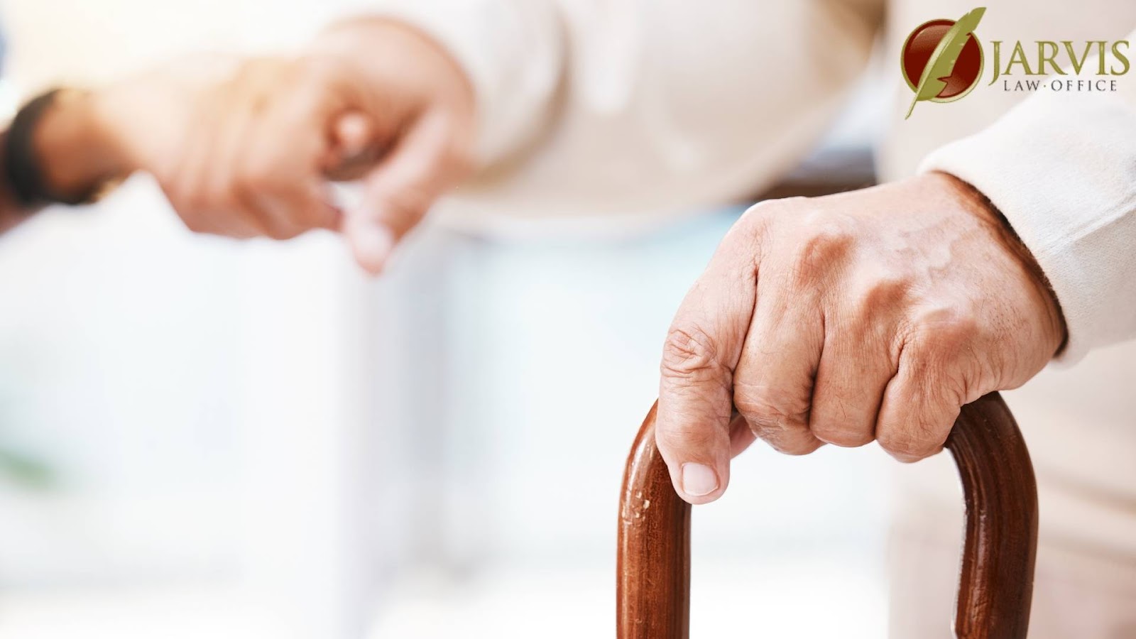 Elderly person holding cane with hand