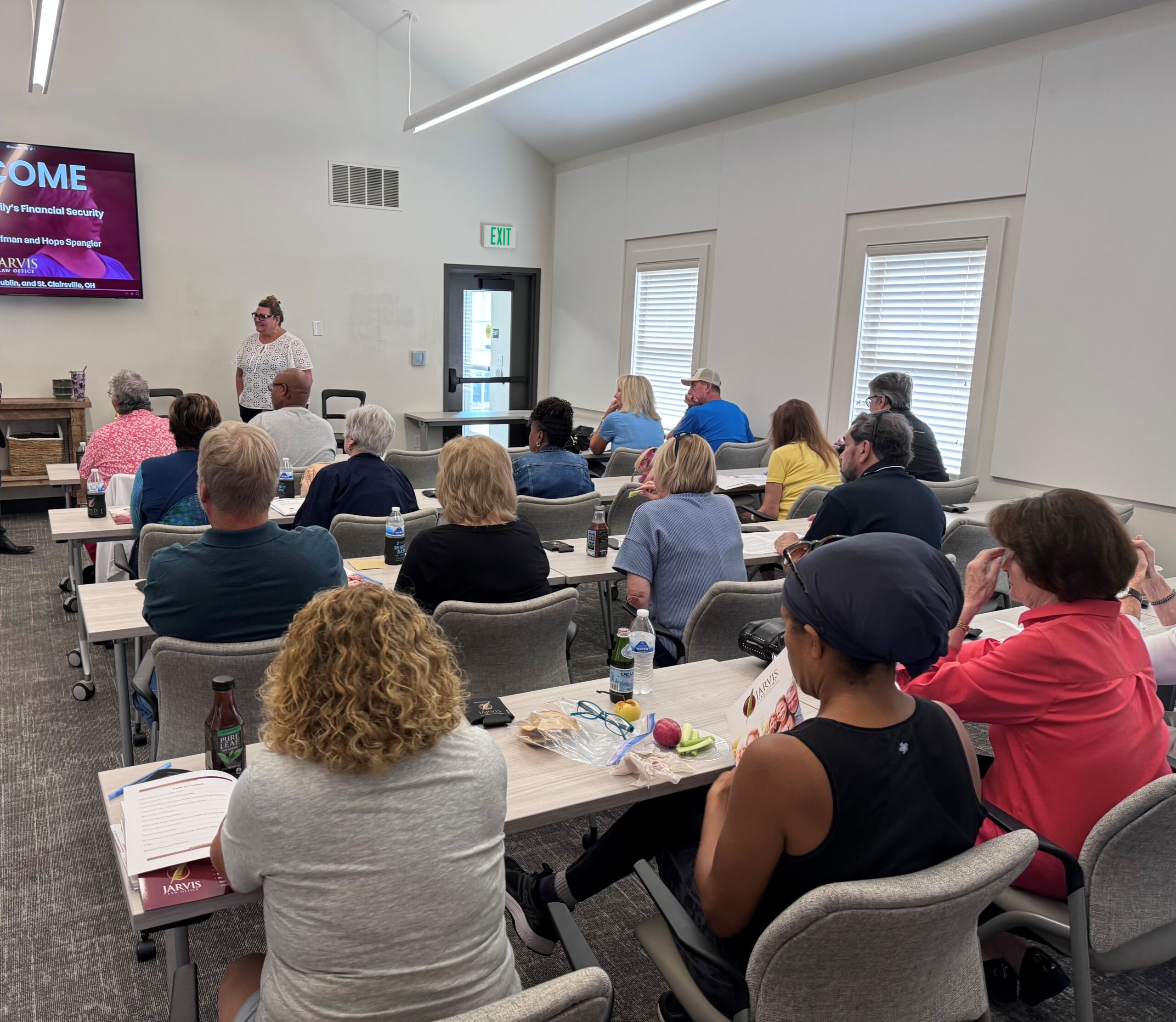 People attending a financial security workshop.
