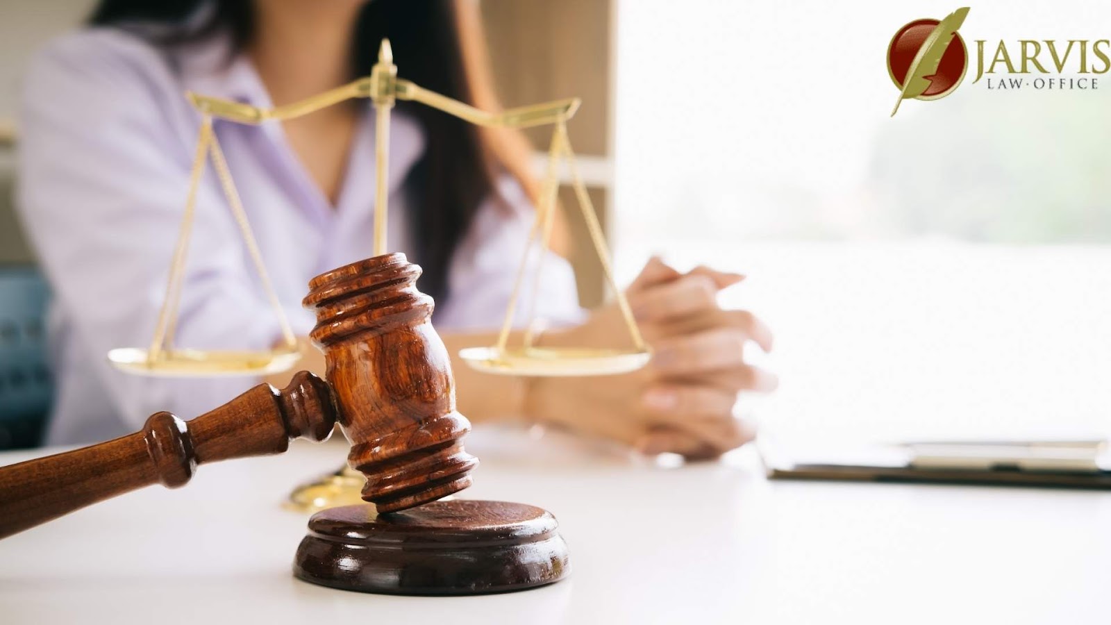 Gavel and scales in law office setting