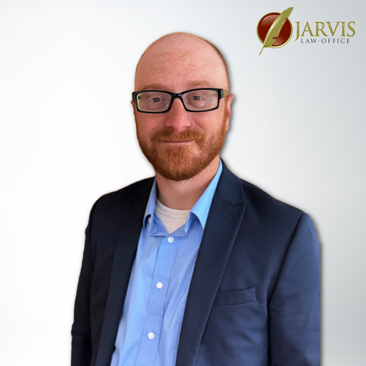 Man in suit with glasses, Jarvis Law Office logo.