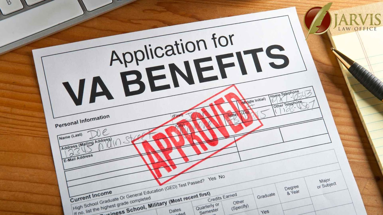 Approved VA benefits application form on desk.