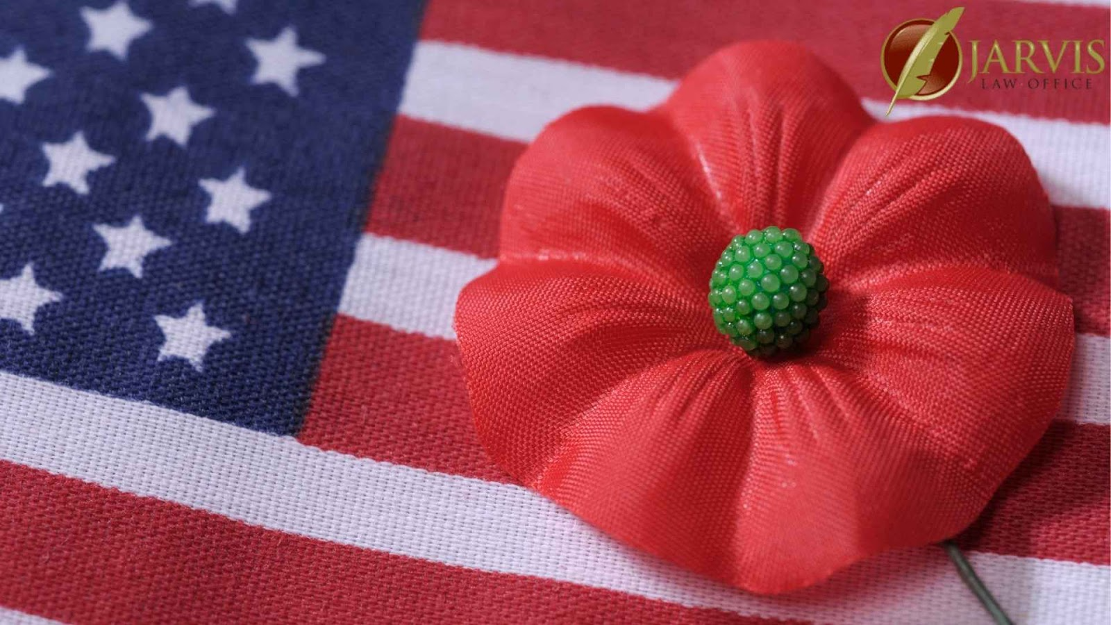 Red poppy on American flag fabric