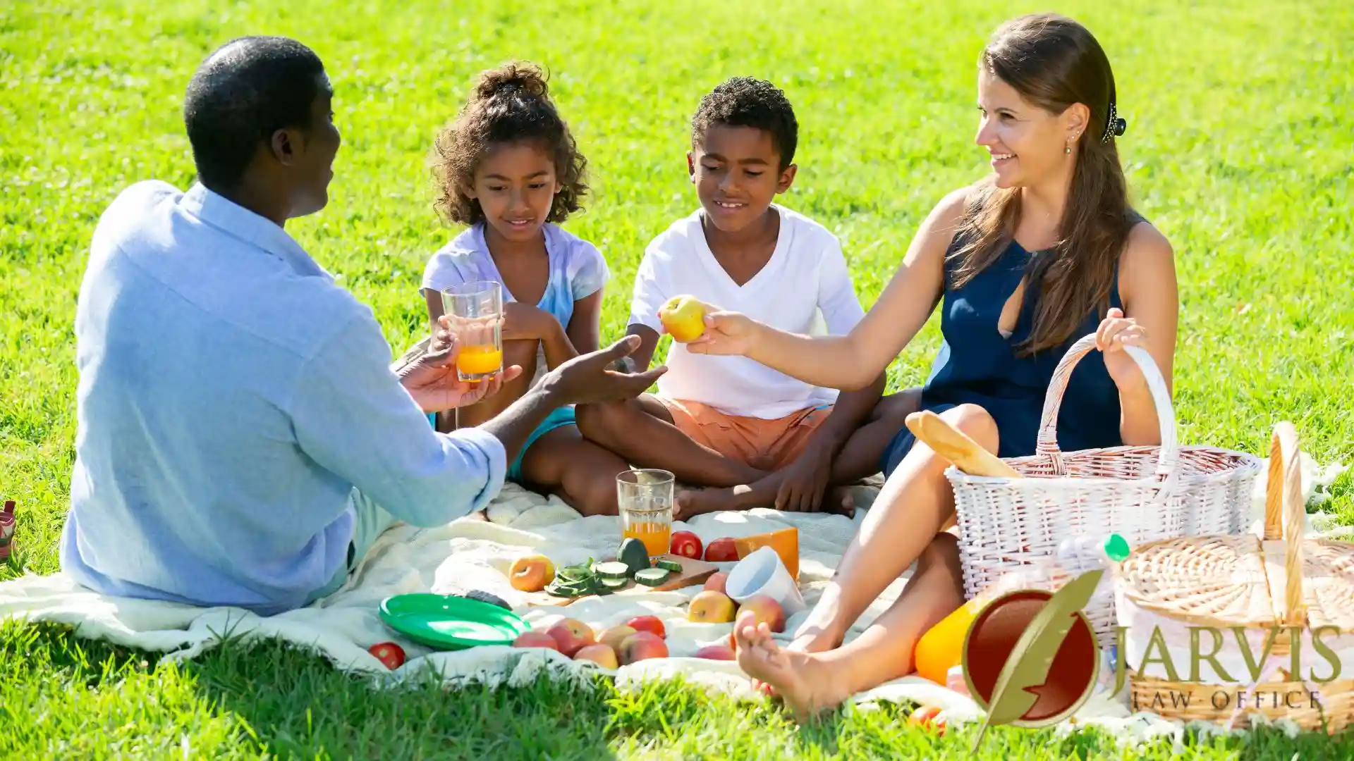 blended family enjoying a picnic in the park.