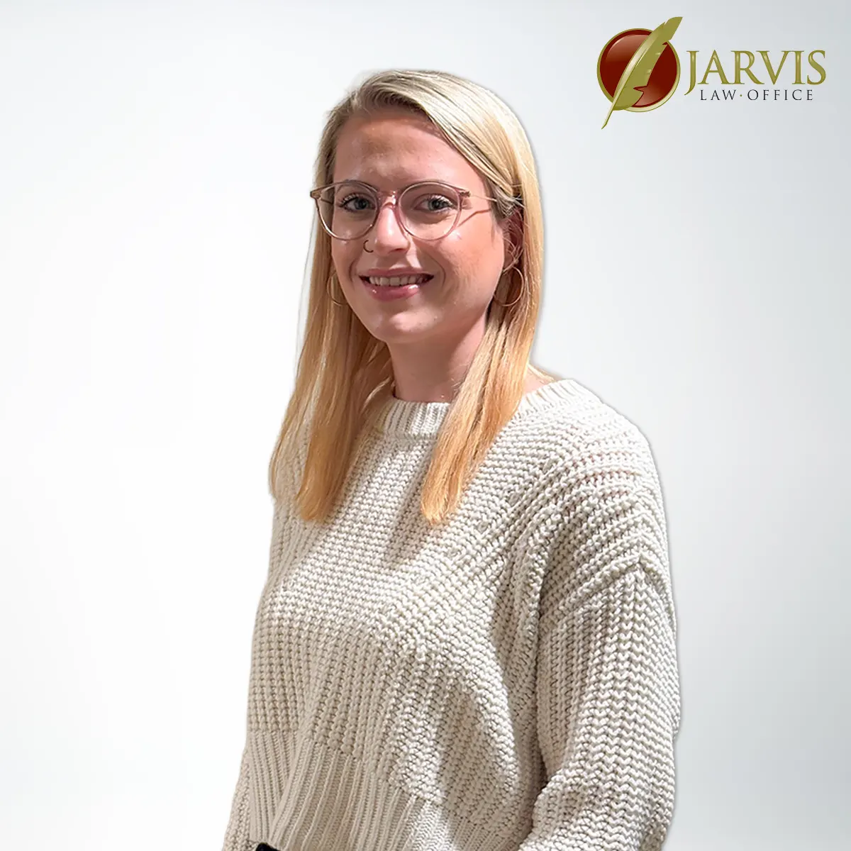 Smiling woman in glasses and sweater