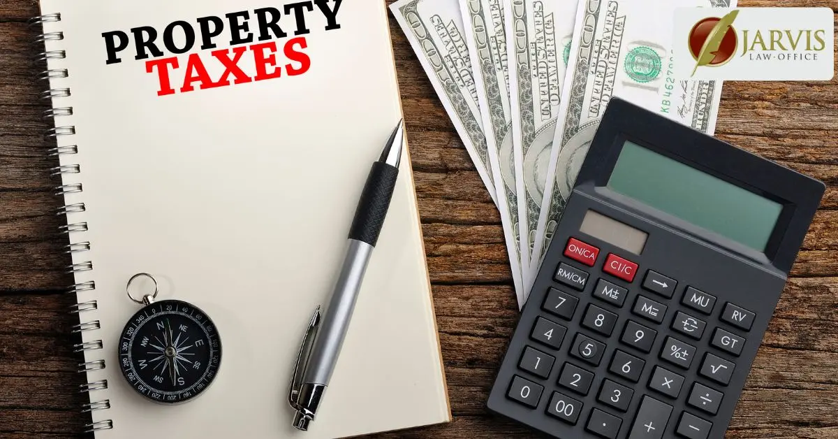 Property taxes notebook with calculator and cash