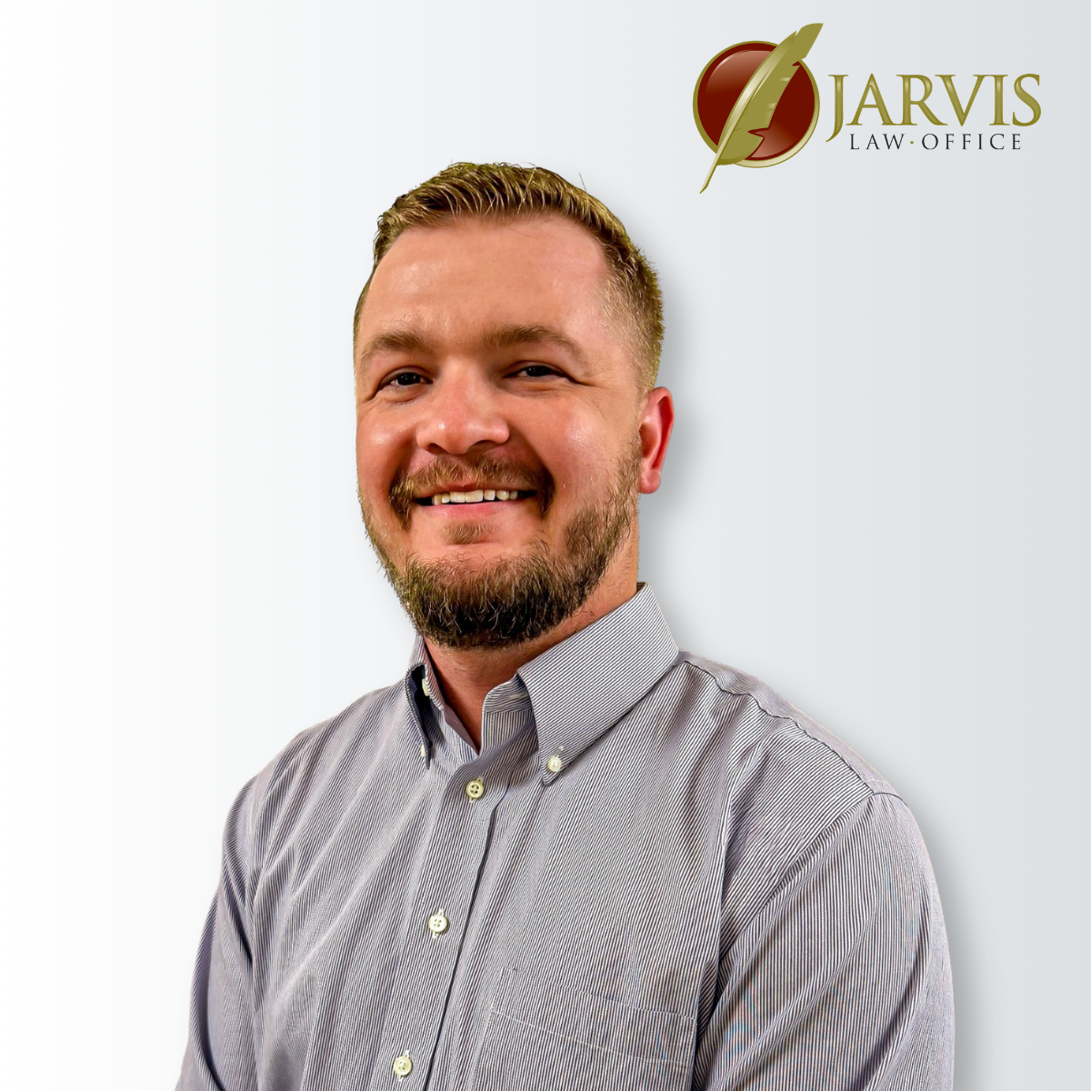 Smiling man in dress shirt beside Jarvis Law Office logo