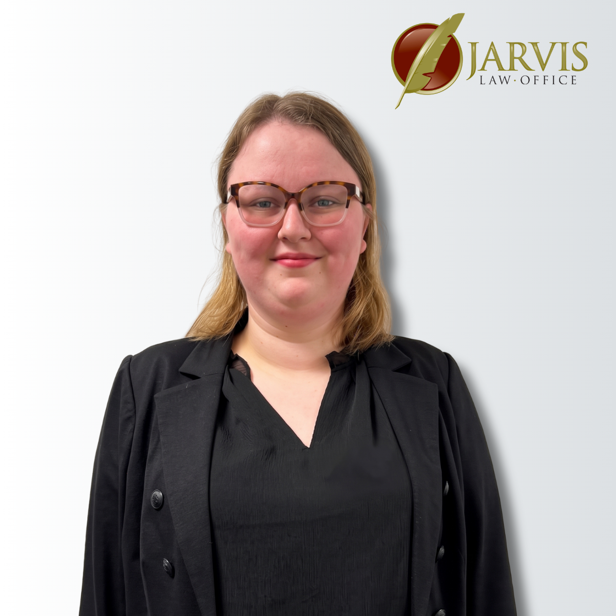 Professional woman in black blazer beside Jarvis Law Office logo