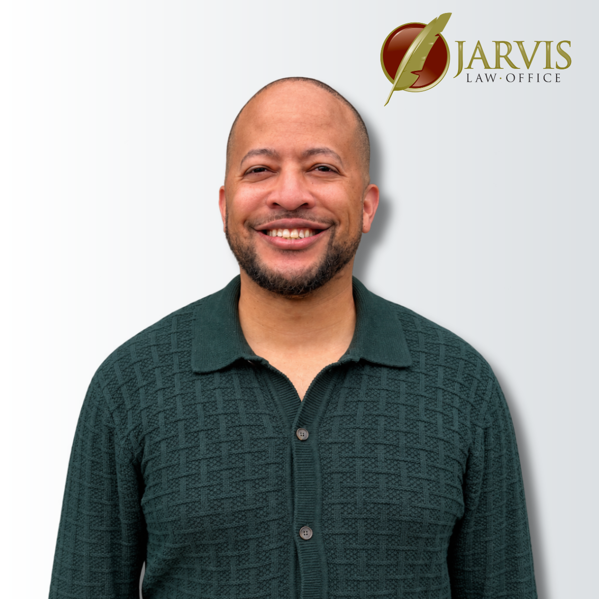Smiling man in green sweater beside Jarvis Law Office logo
